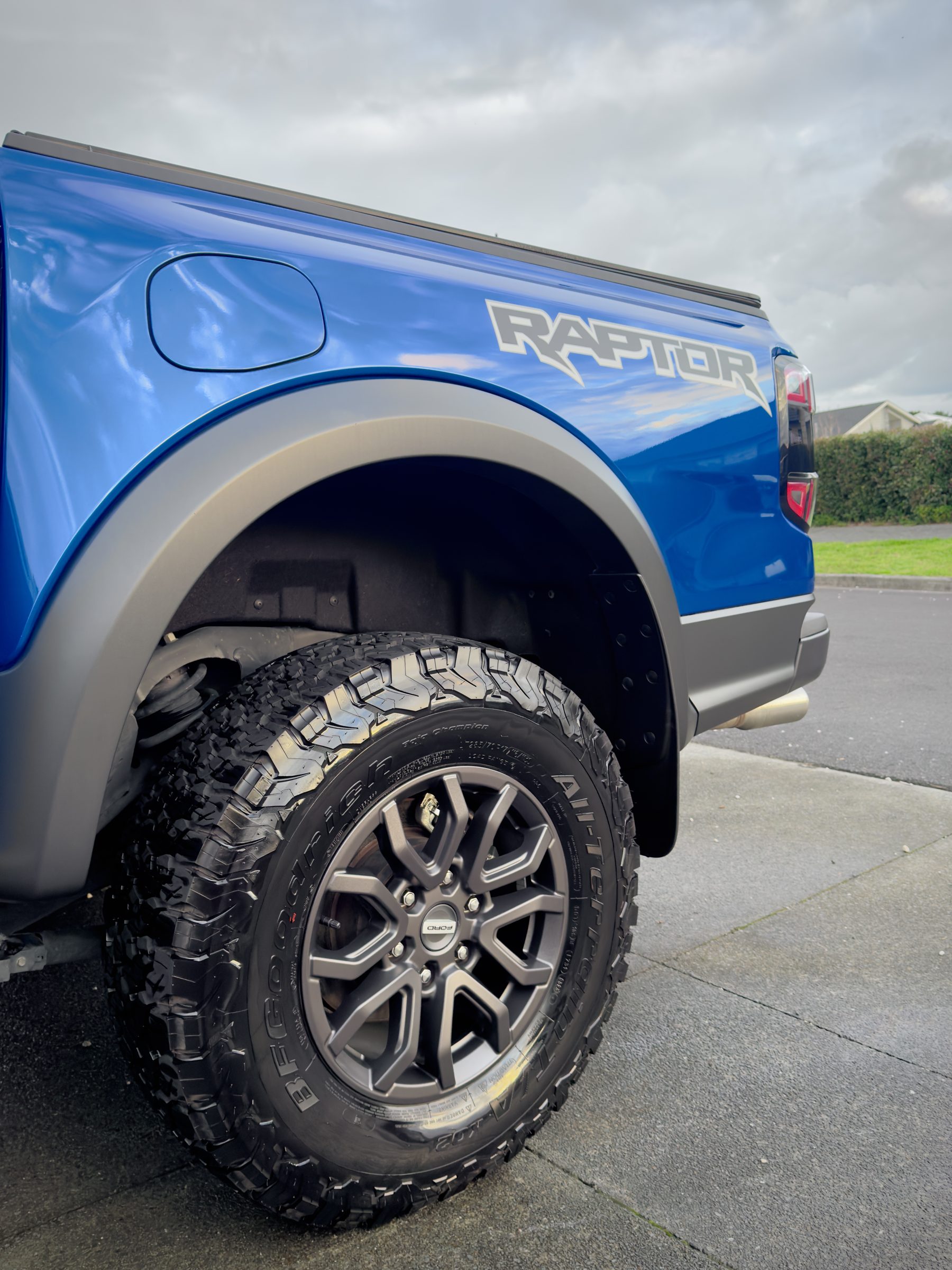 Blue Ford Ranger Raptor rear wheel.